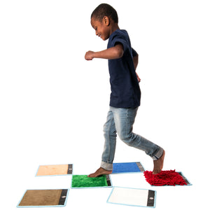 Boy walking on the Sensory Mini Mats