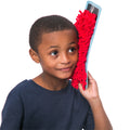 Boy holding the Sensory Mini Mat