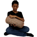 Boy holding the Weighted Log Roll