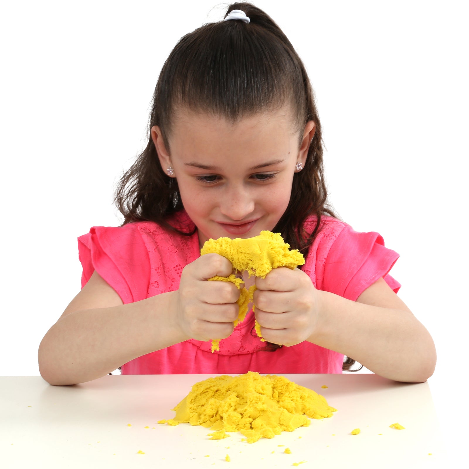 Girl playing with the Scented Weighted Sand