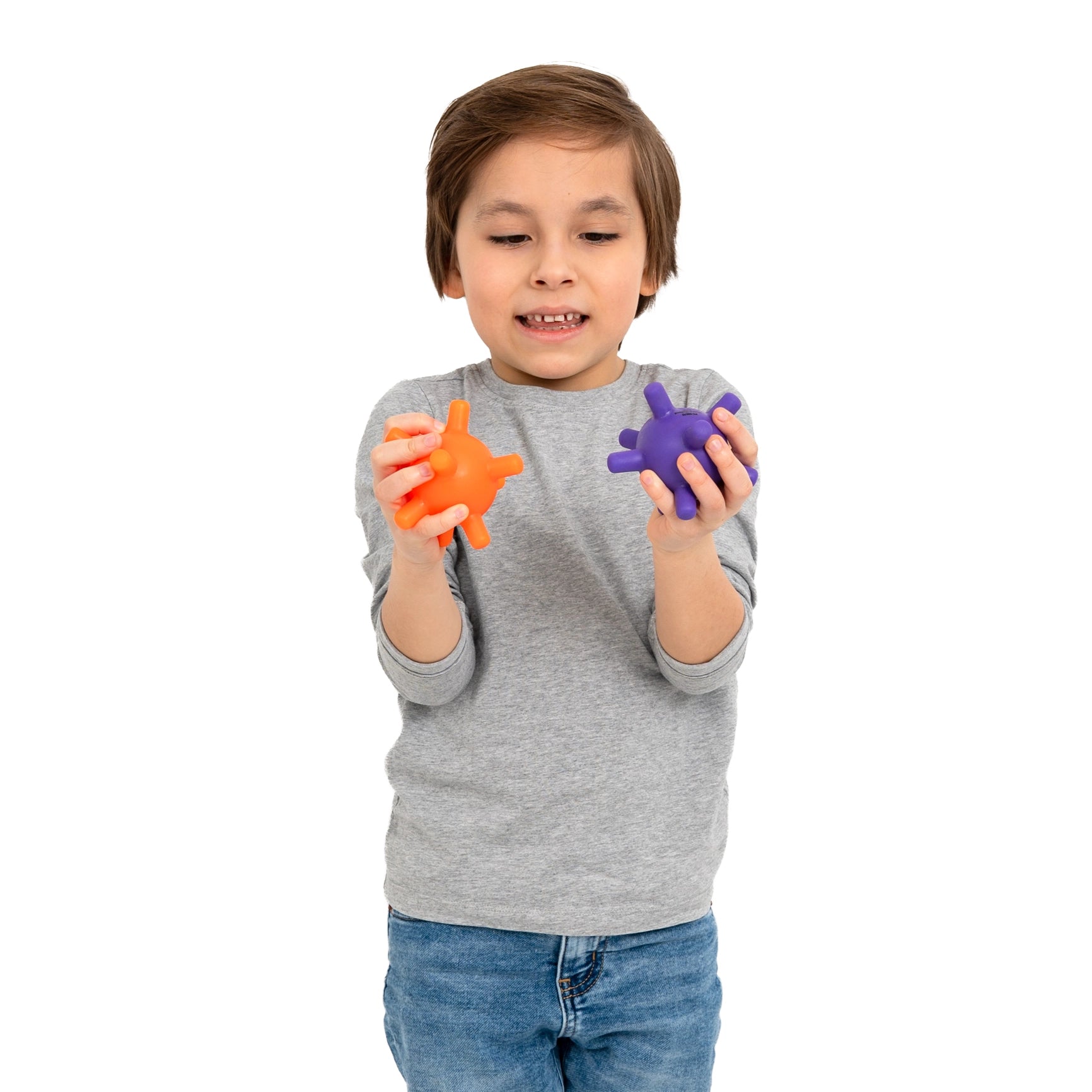 Boy playing with the Spiky Fidget Balls