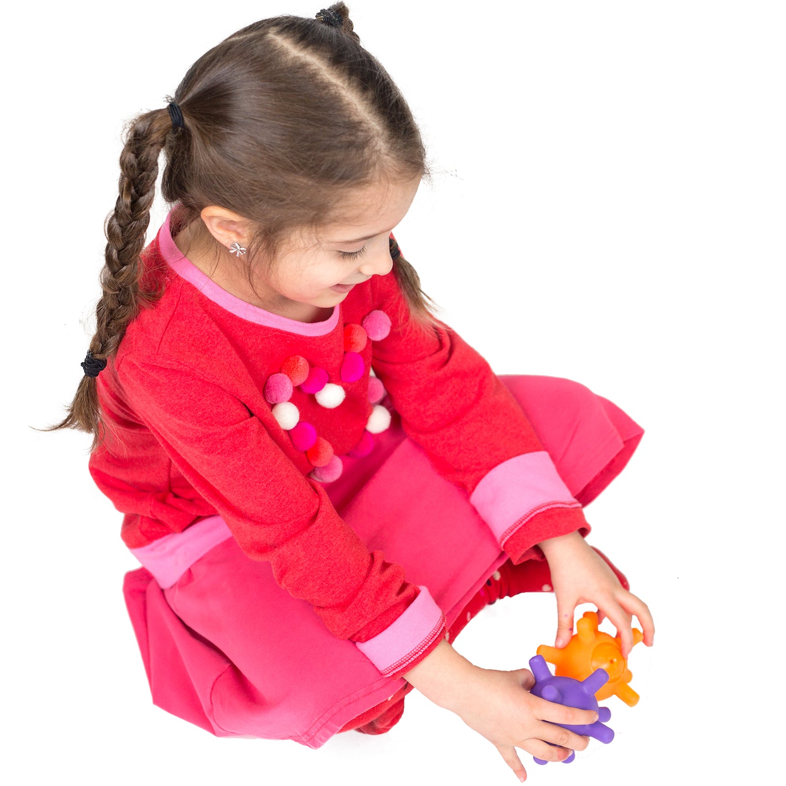 Girl using the Grab It Balls - Set of 2