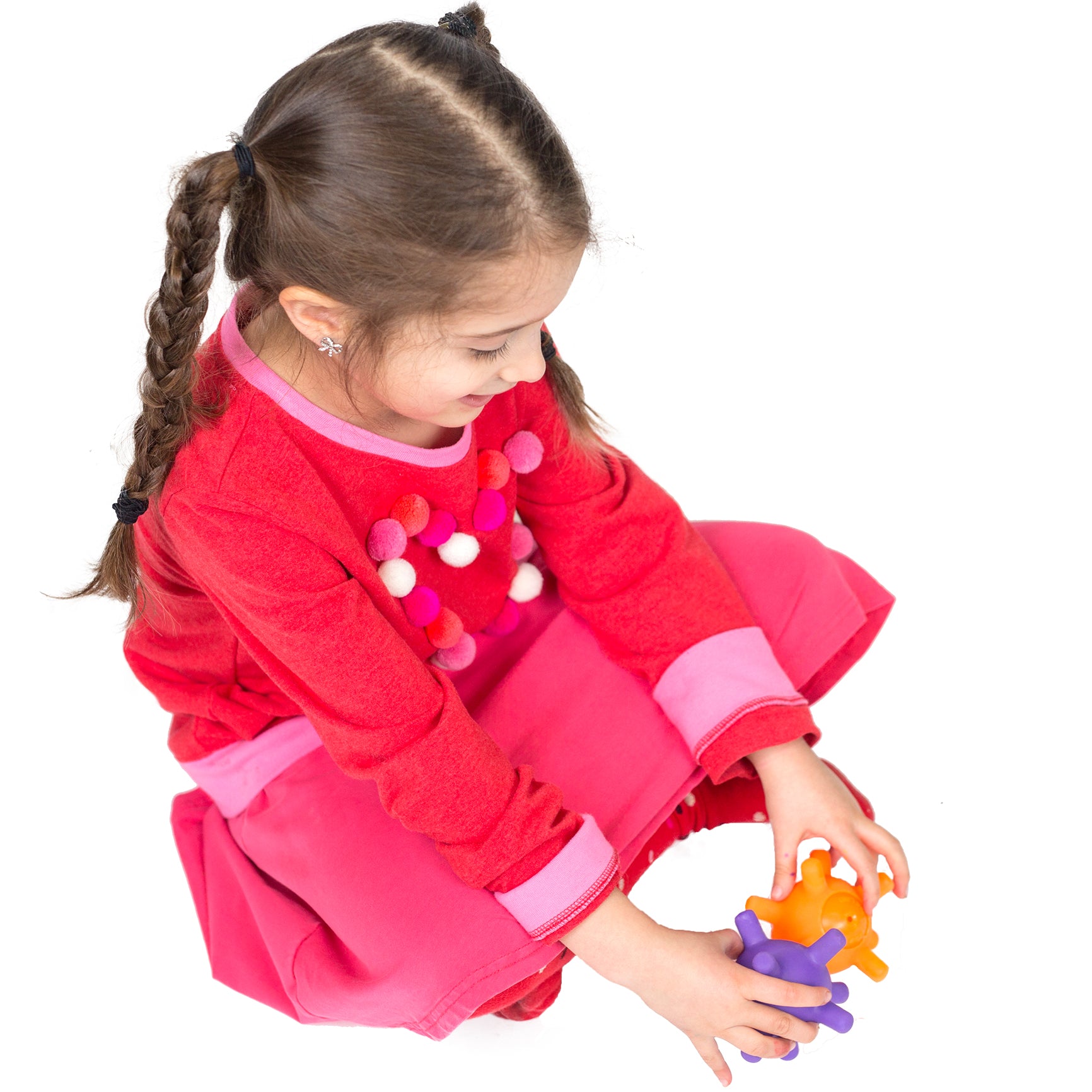 Girl using the Grab It Balls - Set of 2