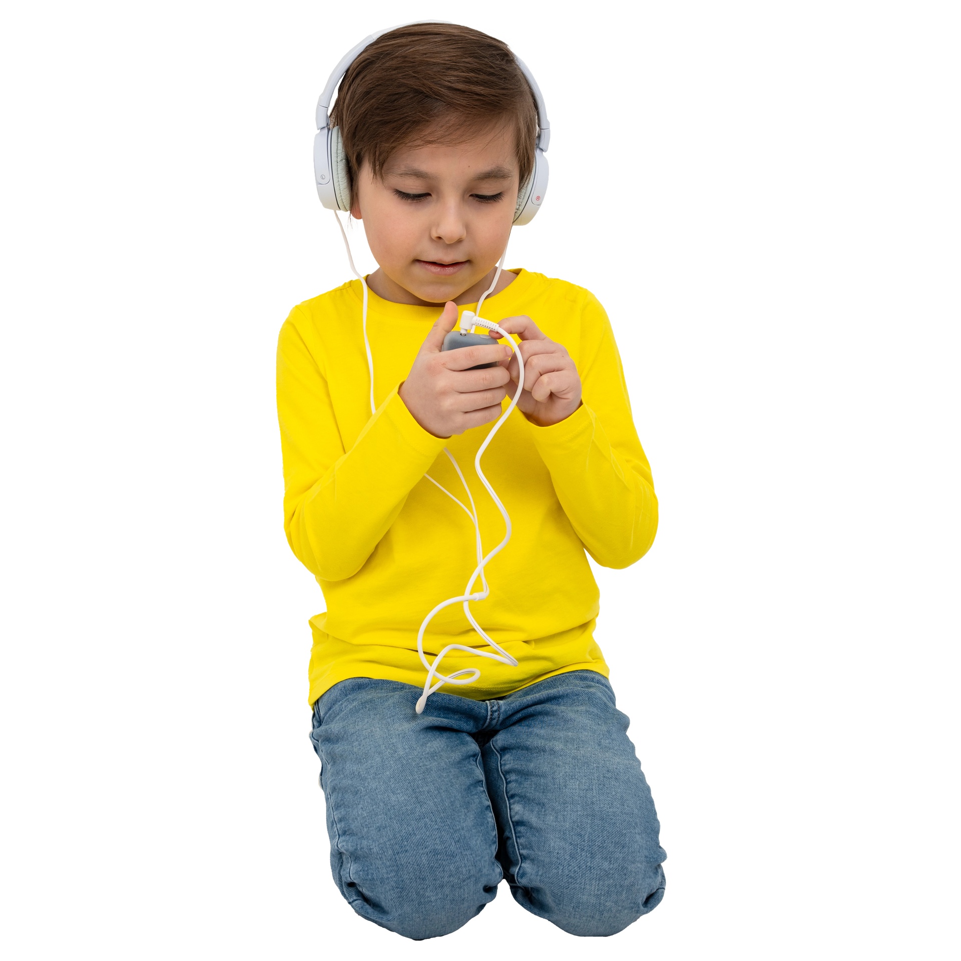 Child wearing headphones and a yellow shirt on a white background