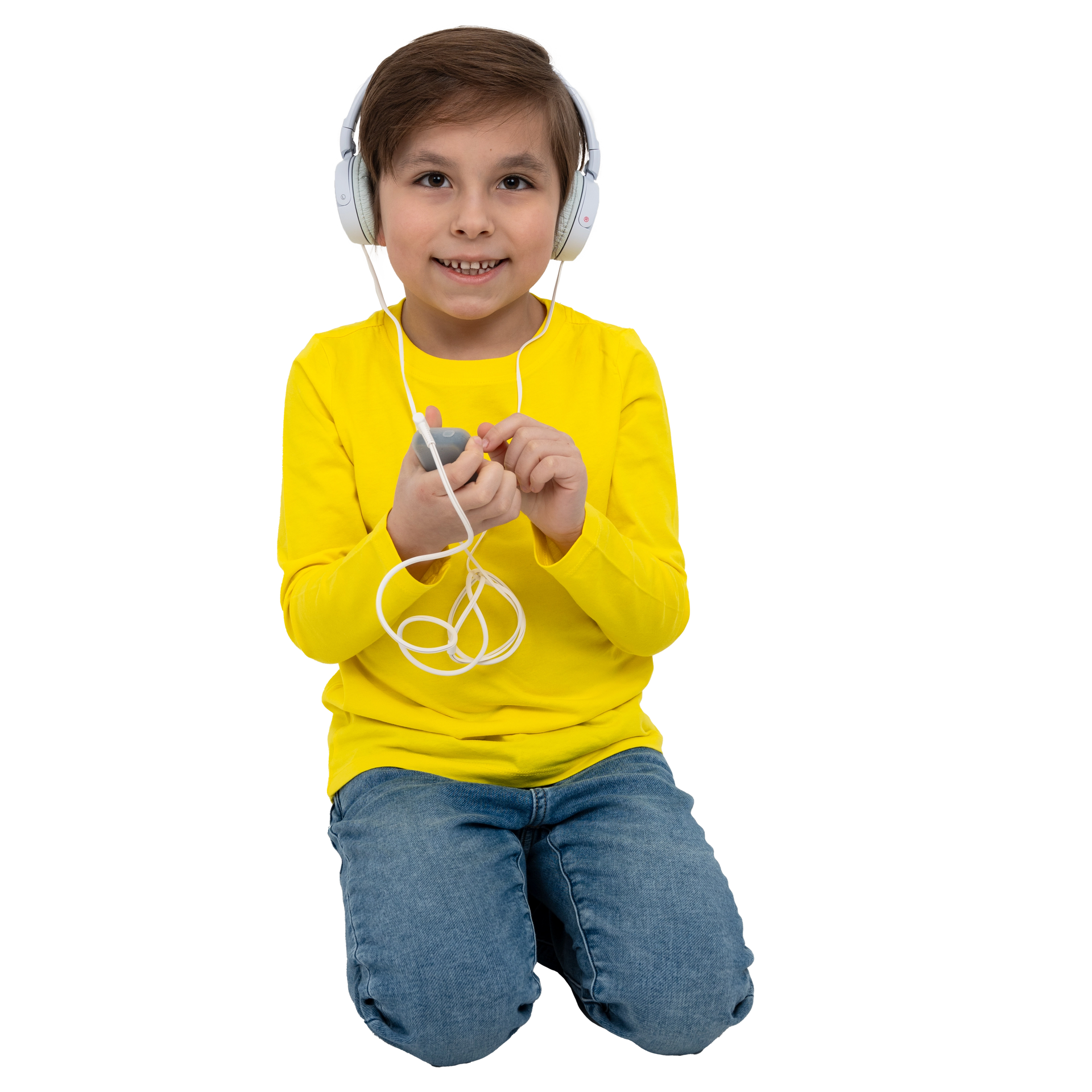 Child wearing headphones and a yellow shirt on a white background