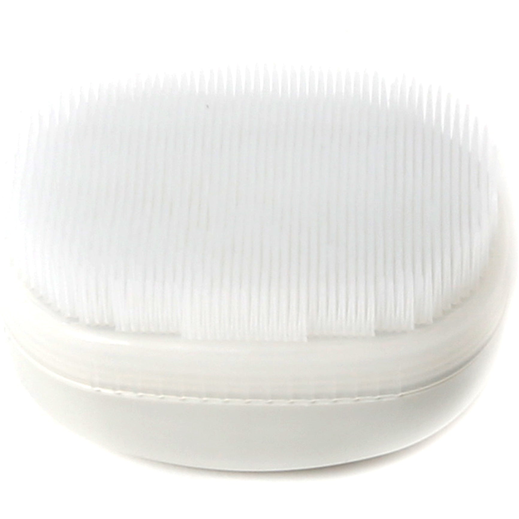 A white Wilbarger Therapy Brush