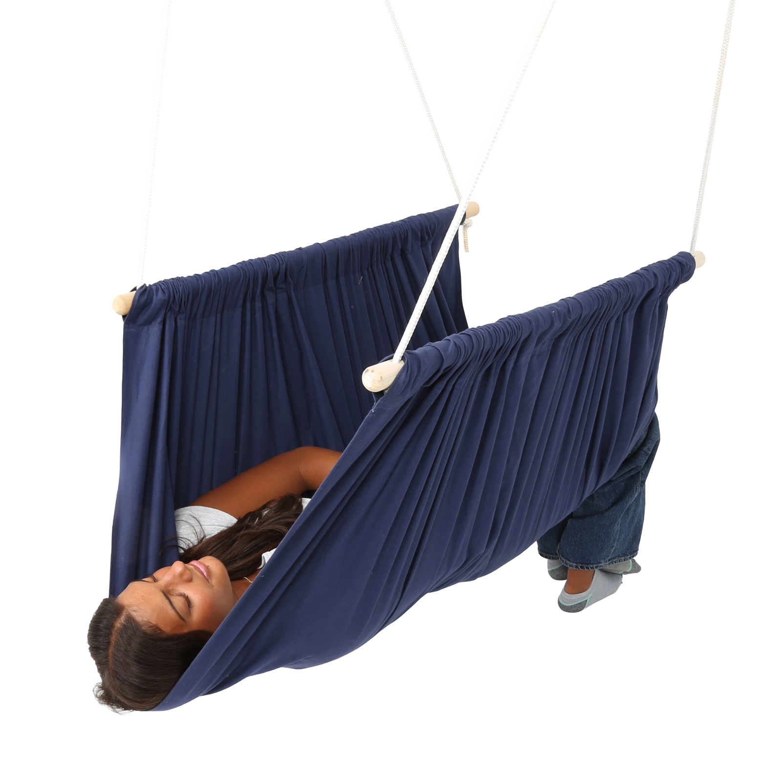 girl lying on her back in the blue Soft Taco Swing