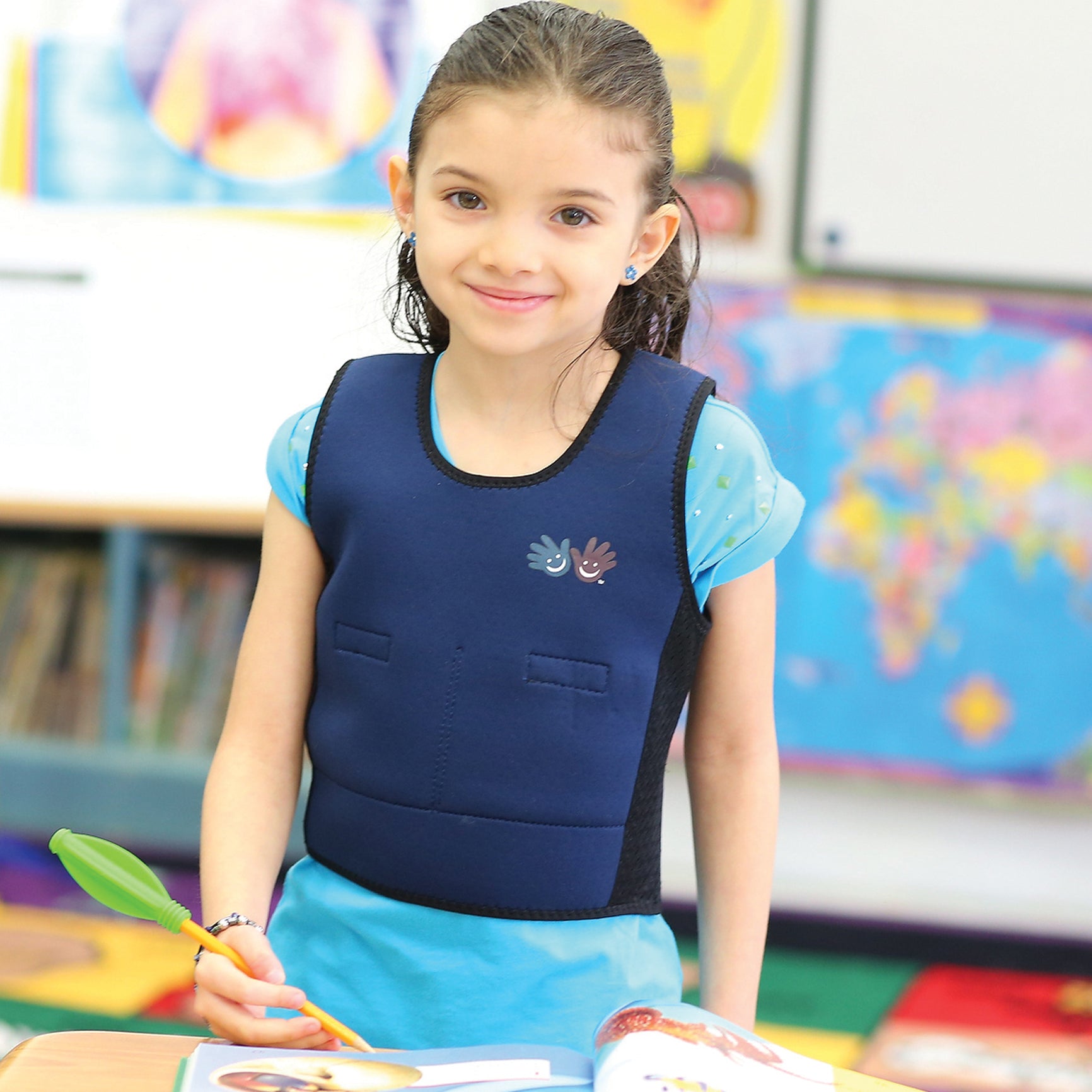 Girl smiling while wearing The Original Weighted Compression Vest