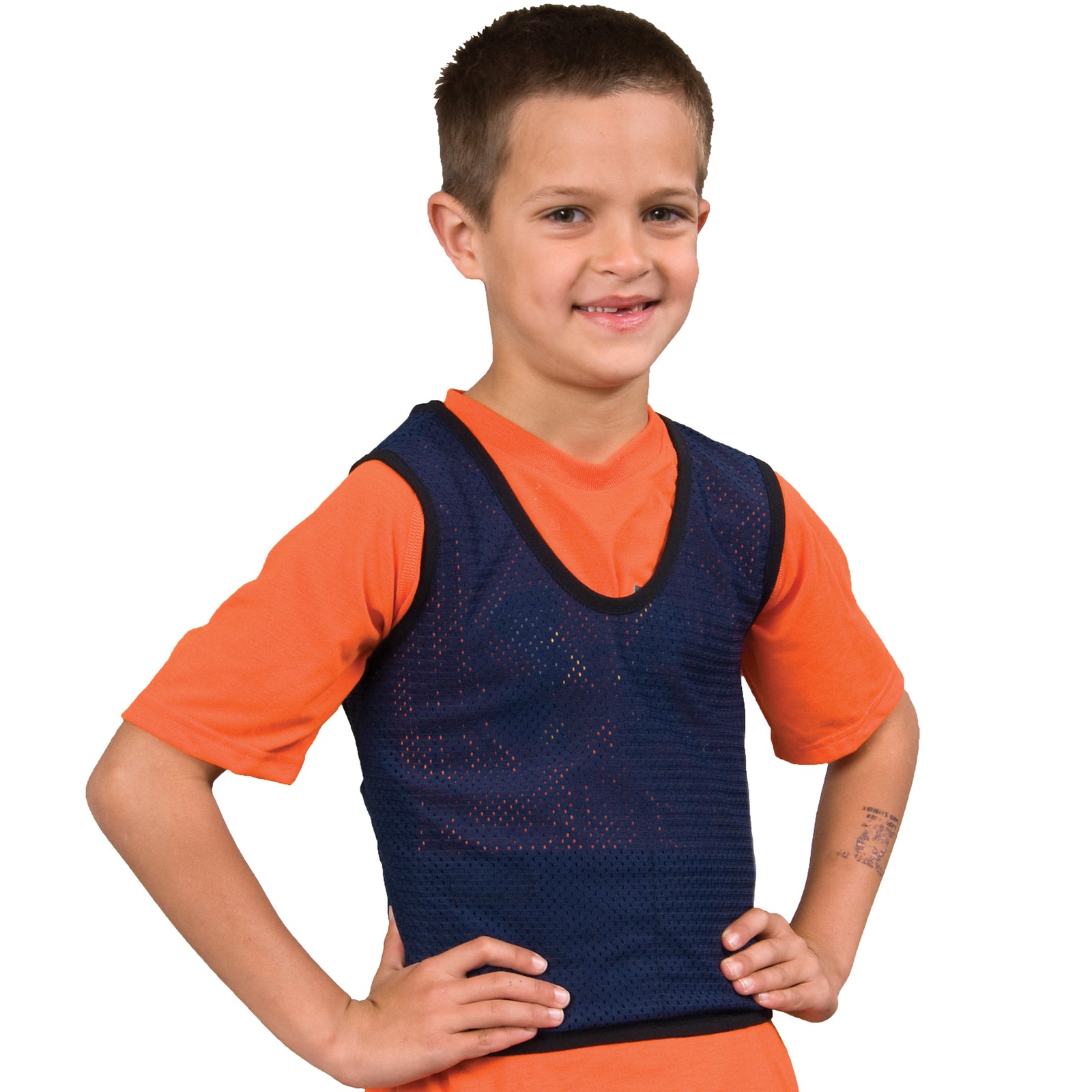 Boy smiling while wearing the Pressure Mesh Vest