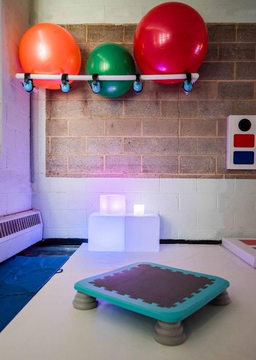 orange, green and red therapy balls