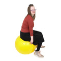 Girl using the yellow Chair Ball