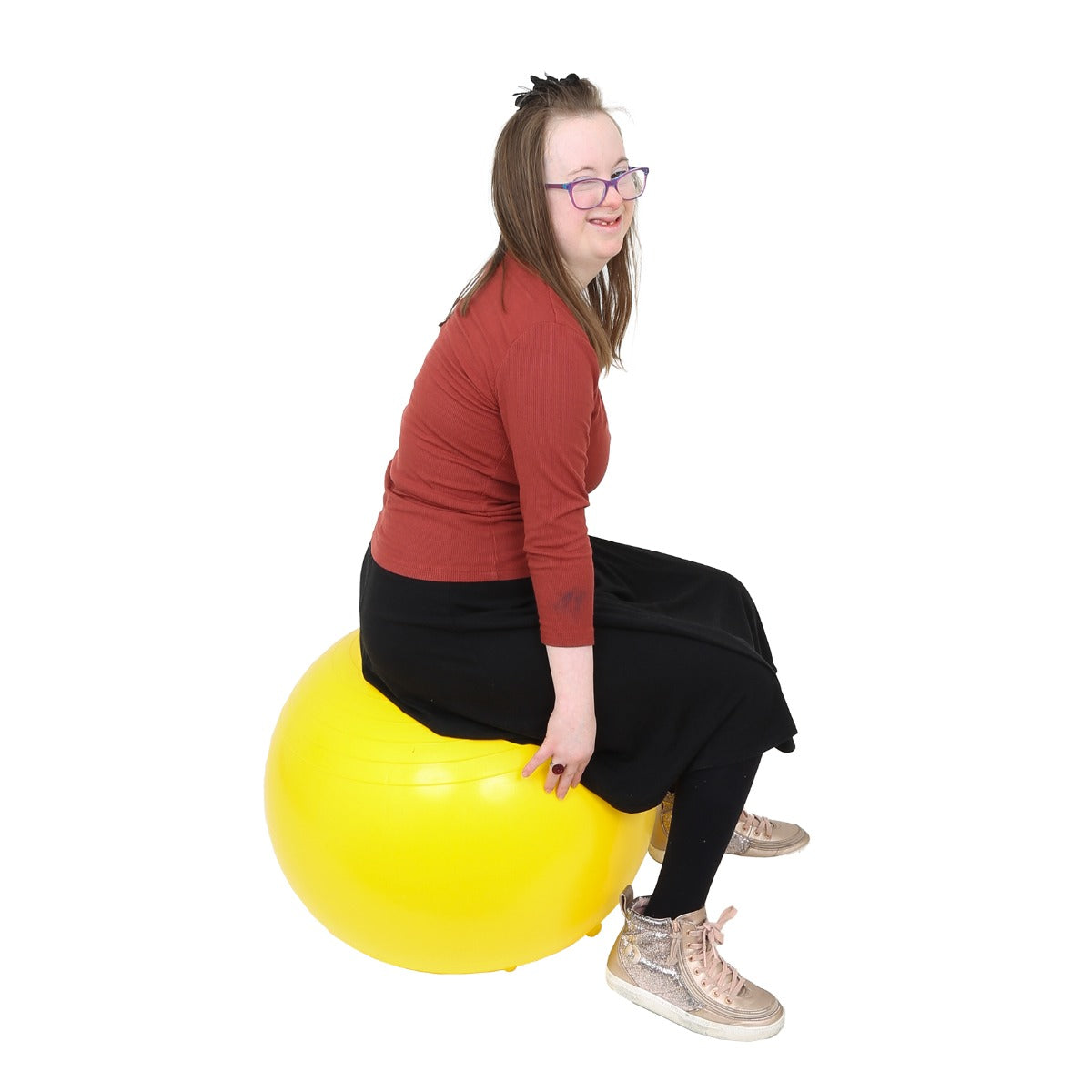 Girl using the yellow Chair Ball