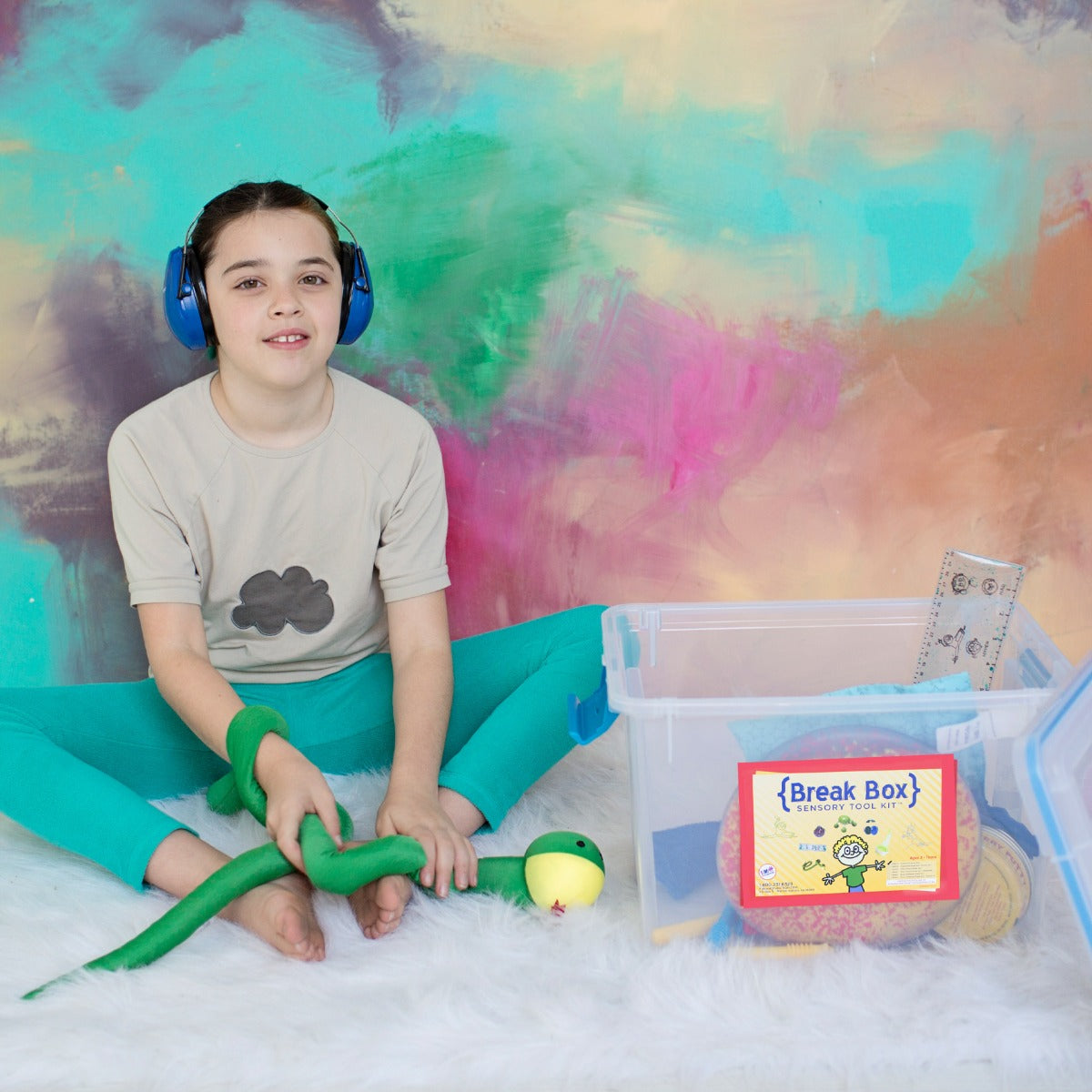 Girl playing with the Break Box Sensory Tool Kit