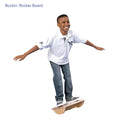 Boy smiling while using the Rockin' Rocker Board
