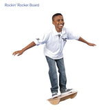 Boy smiling while using the Rockin' Rocker Board
