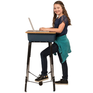 Girl working at a desk using The Original FootFidget  Footrest