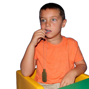 Boy using the Dog Tag Chewies - Set of 2