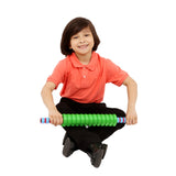 Boy smiling while using the Textured Foam Roller