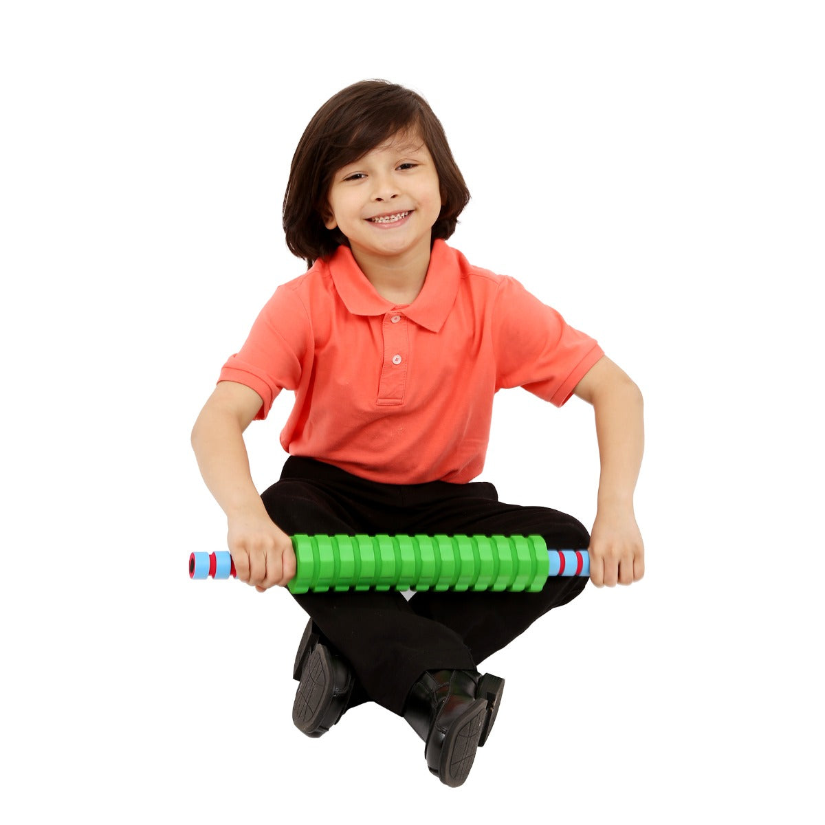 Boy smiling while using the Textured Foam Roller