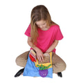 Girl using the At the Beach Discovery Bag