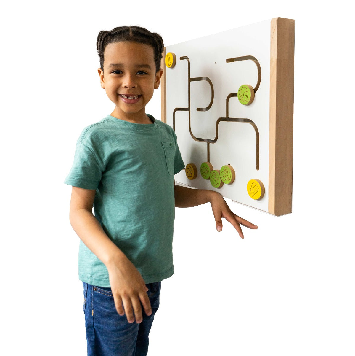 Boy smiling next to the Sensory Activity Panel