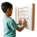 Boy playing with a Sensory Activity Panel