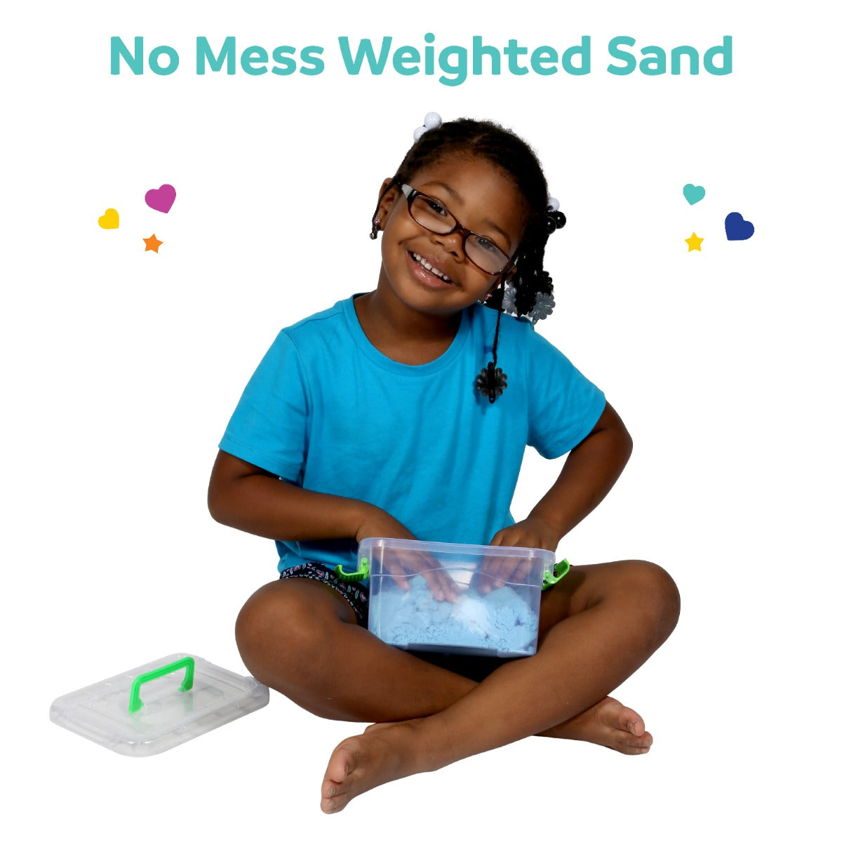 Child smiling while playing with the Glitter Weighted Sand