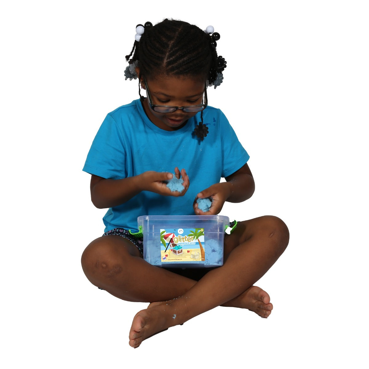 Child playing with the Glitter Weighted Sand