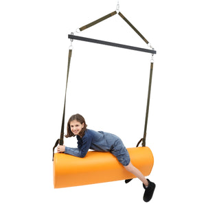 Girl smiling while using the SensaSoft™ Bolster Swing