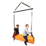 Two boys smiling while using the SensaSoft™ Bolster Swing