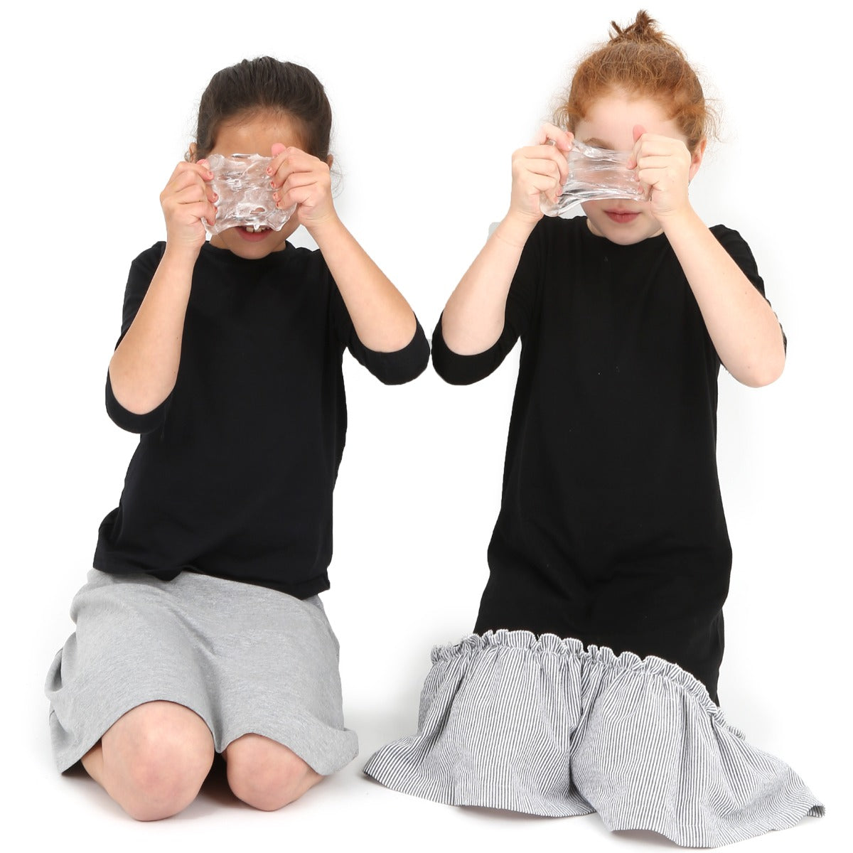 Children playing with the Emotions See Through Putty