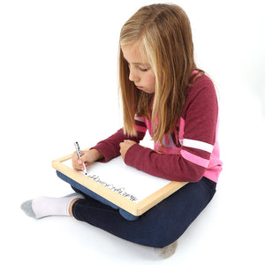 Girl using the Weighted Dry Erase Board Lap Pad