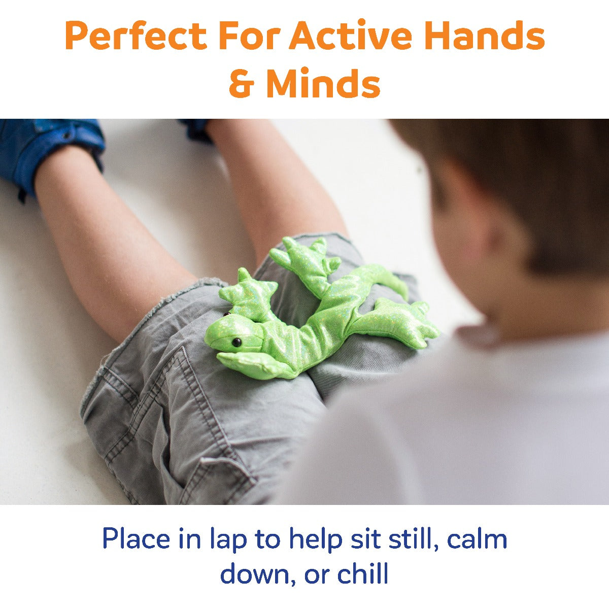 Boy playing with the Weighted Fidget Lizard