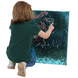Child playing with the Sensory Wall Panel