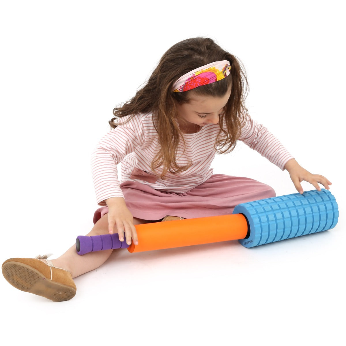 girl using the 2 in 1 Textured Foam Roller