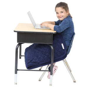 Girl sitting at a desk while using the Minky Weighted Blanket