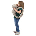 Child kissing the Sloth Heavy Hugger