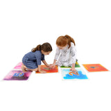Girls using the Hopscotch Gel Floor Tiles