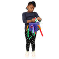 Girl using the Wipe Clean Ribbon Push and Pull Cube