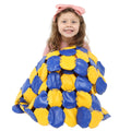 Girl smiling while holding the Weighted Disc Blanket