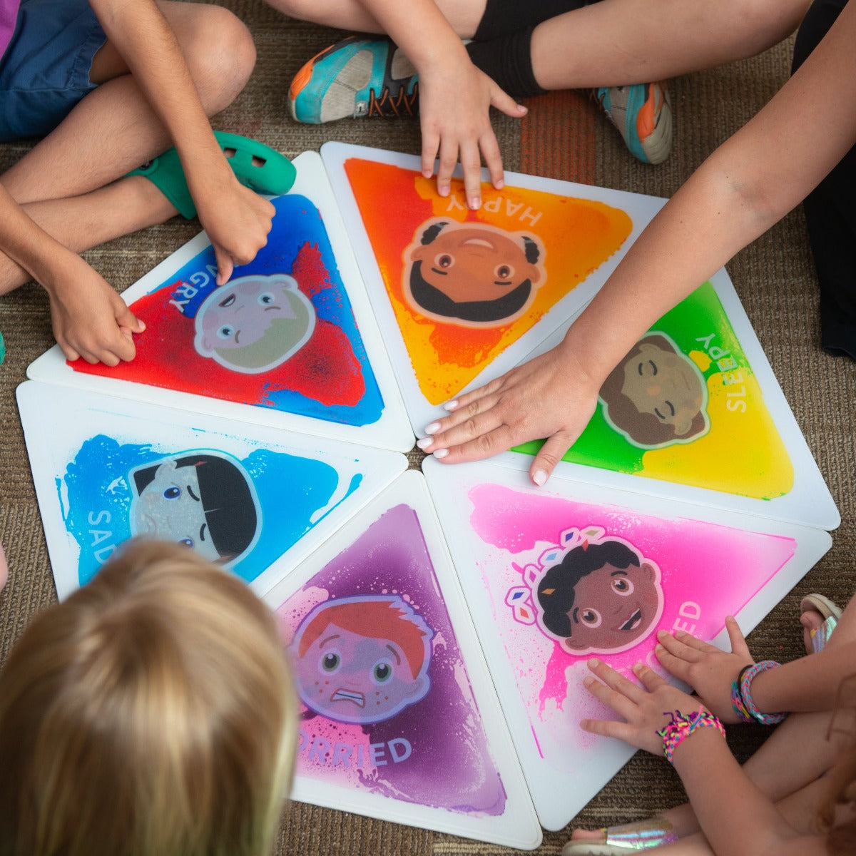 Children playing with the Emotion Gel Tiles