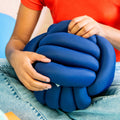 Person holding the Weighted Sensory Knot Ball