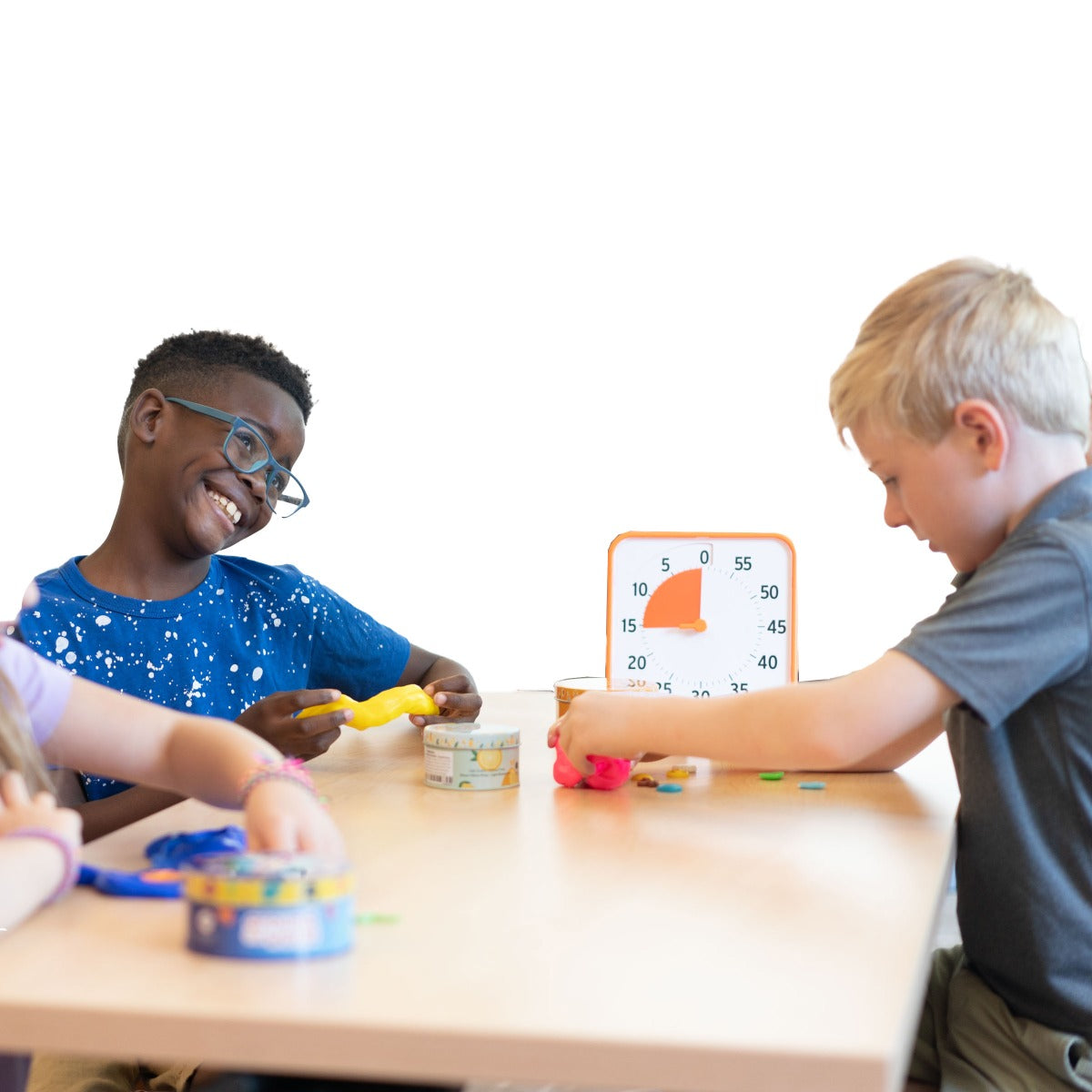 Two boys playing while using the Time Timer 8" Learning Center Classroom Set