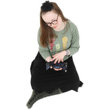 Girl using the Weighted Sequin Fidget