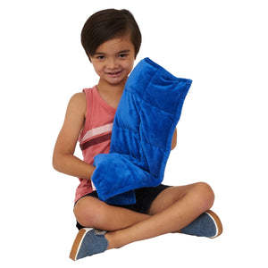 boy holding the Minky Weighted Lap Pad