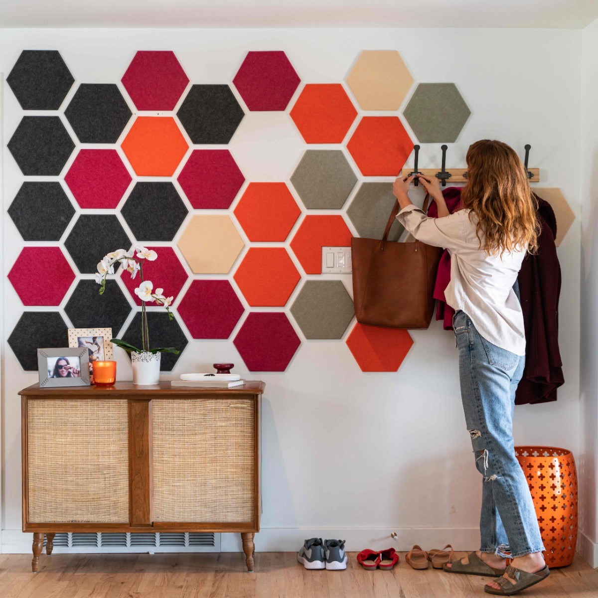 Woman in room with Felt Right Tiles-Adobe Riptide design