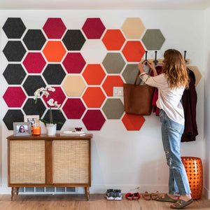 Woman in room with Felt Right Tiles-Adobe Riptide design