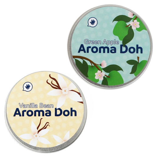 Closed tubs of Green Apple and Vanilla Bean Aroma Doh