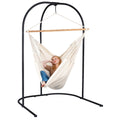 girl in hammock attached to swing stand