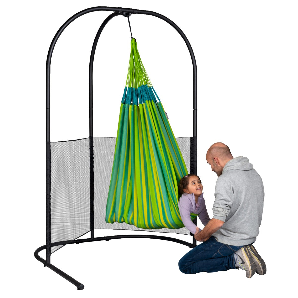 child in therapy hammock swing attached to swing stand